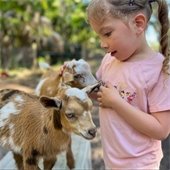 girl and goat